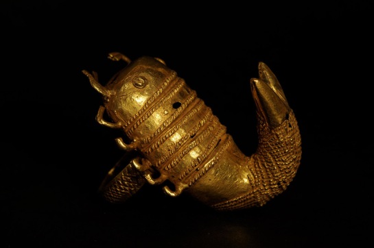 Gold ring with scorpion design